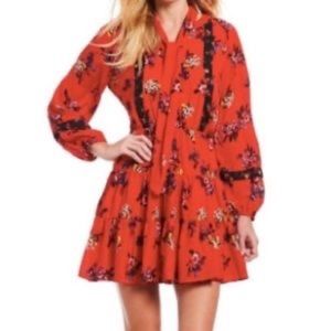 Medium Red floral cute dress long sleeve with neck tie.